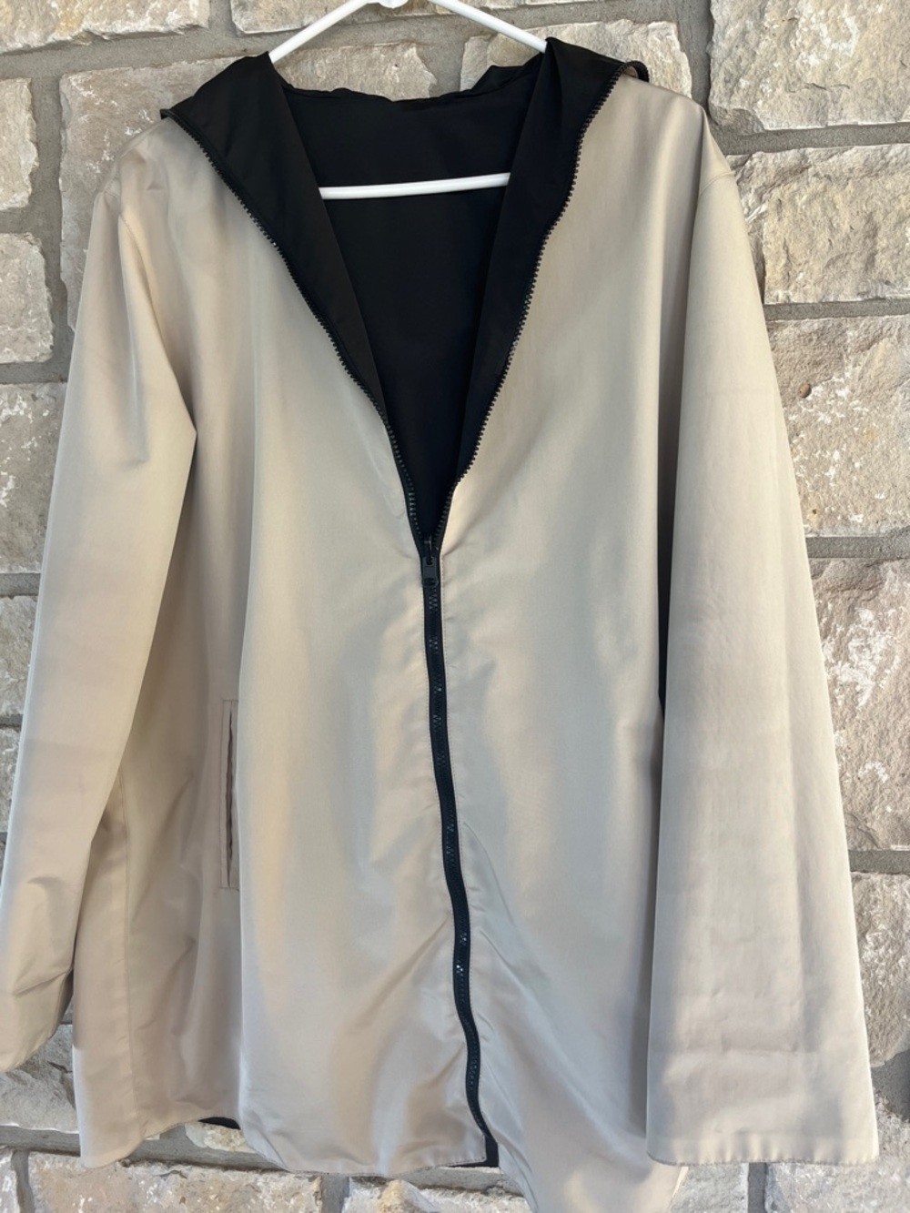 Reversible Tan and Black Hooded Zippered Rain Jacket with Storage Bag - Picture 2 of 8